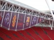 Champions League Final branding Installing South Gantry banners